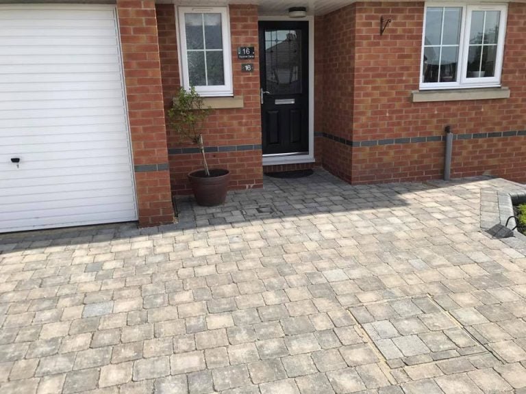 Stone driveway paving completed with modern building and garage, Turfing, Landscaping design, paving and walls, decking, block paving and driveway, planting, ponds and water features, gates and fences, garden sheds, patios and terraces in Calne, Devizes